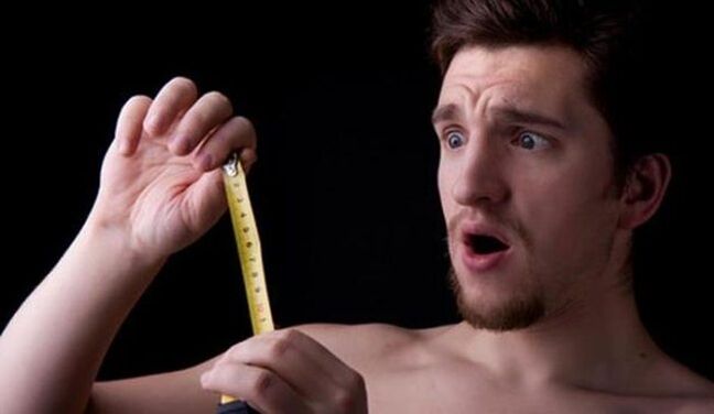 the man measured the penis before enlargement